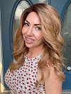 Blonde Blend with face-framing layers and soft wavy Synthetic Lace Part Wig GLP036